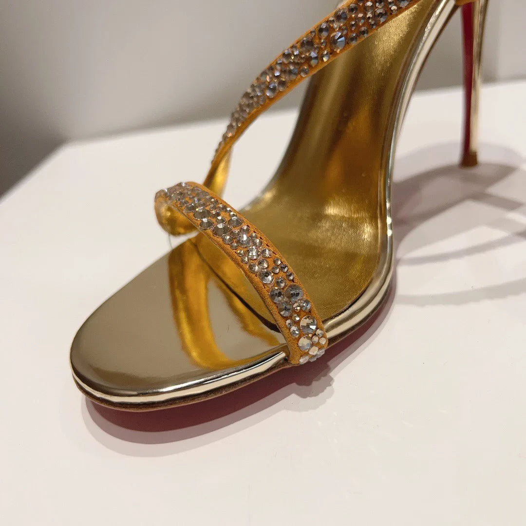 Thin heeled gold thong Sandals