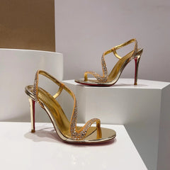 Thin heeled gold thong Sandals